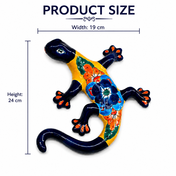 A colorful decorative lizard figurine shown on a white background with measurement lines and text indicating product size: width 19 cm and height 24 cm. The lizard is glossy and painted with a yellow body, dark blue head/tail/legs, and bright floral accents in blue, orange, green, and white.