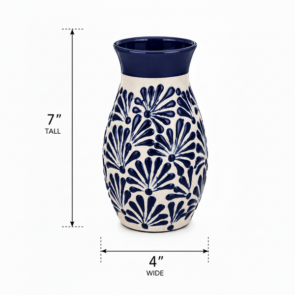 Ceramic vase with blue and white pattern and dimensions on a white background