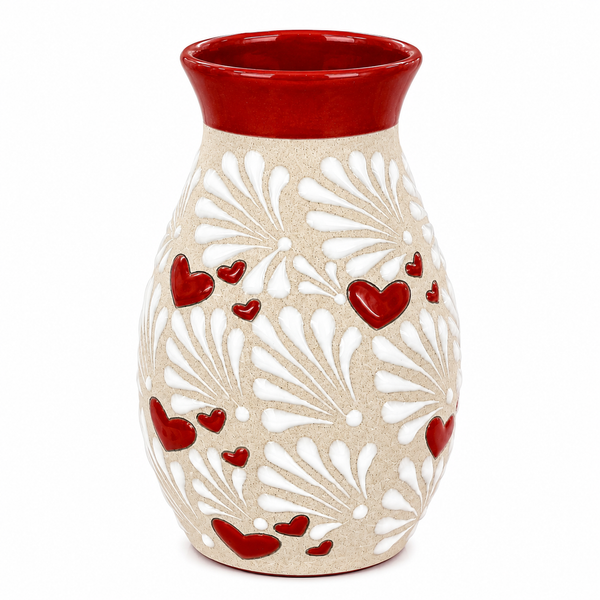 Ceramic vase with red hearts and a red rim on a white background